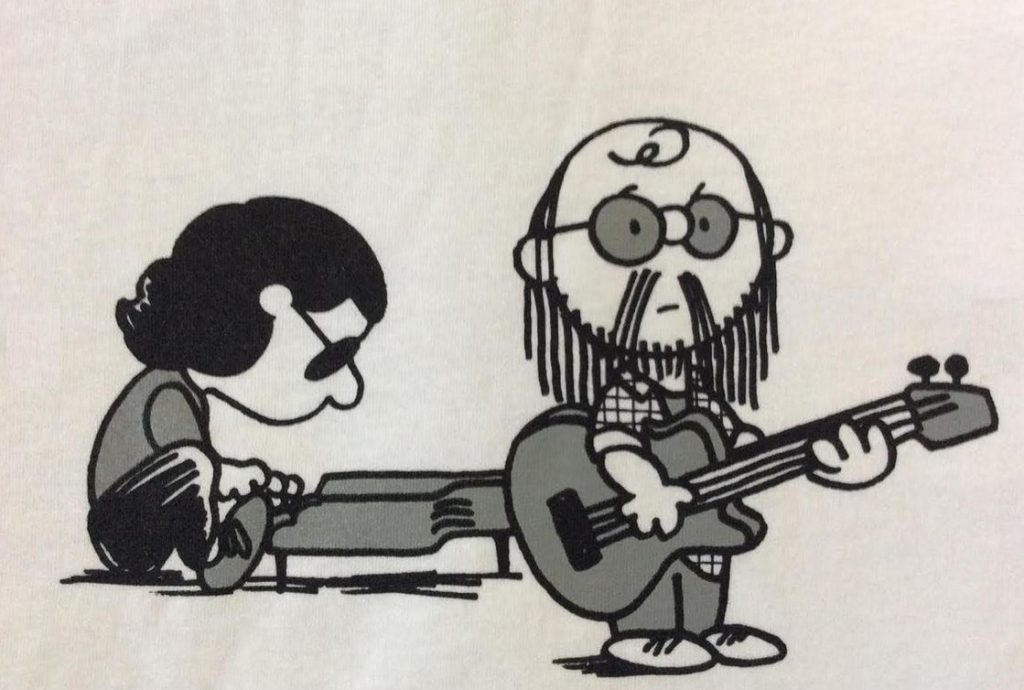 Steely Dan depicted as Peanuts' Schroeder and Linus

or Visa Versa